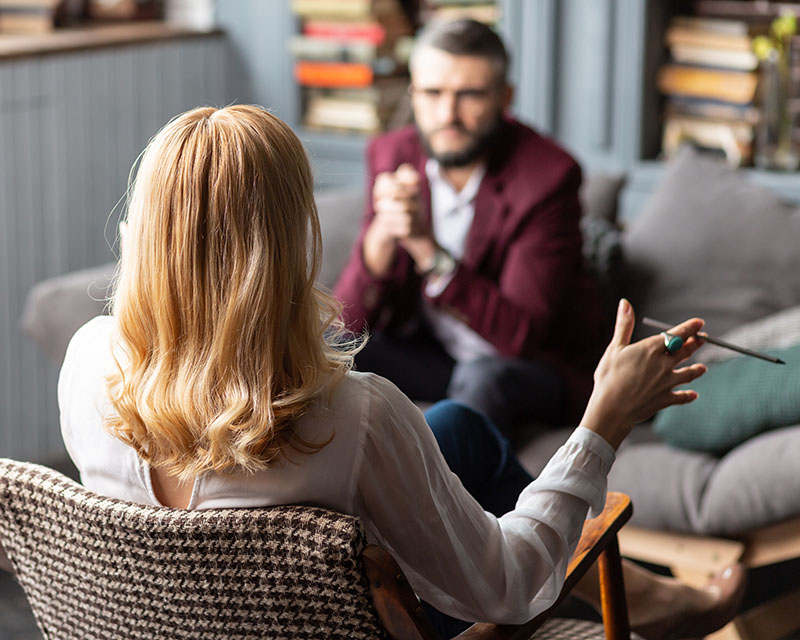 Image of a man talking with an EMDR therapist in the Washington D.C. area. EMDR can help you overcome trauma, anxiety, depression, and more. We can help you overcome negative memories with EMDR therapy in Washington D.C. area 20817. Contact us today!